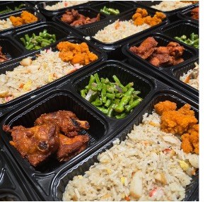 Bento sets with fried rice, chicken and long beans
