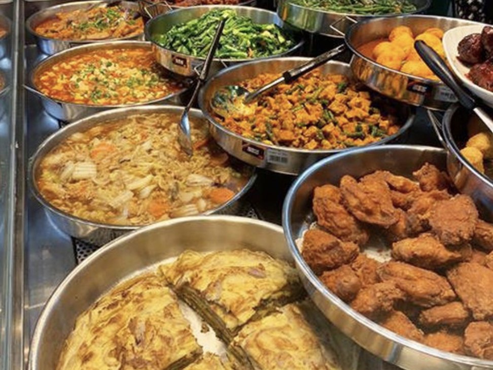Home-style dishes at a staff cafeteria: mapo tofu, long beans, braised cabbage, fried chicken and omelette
